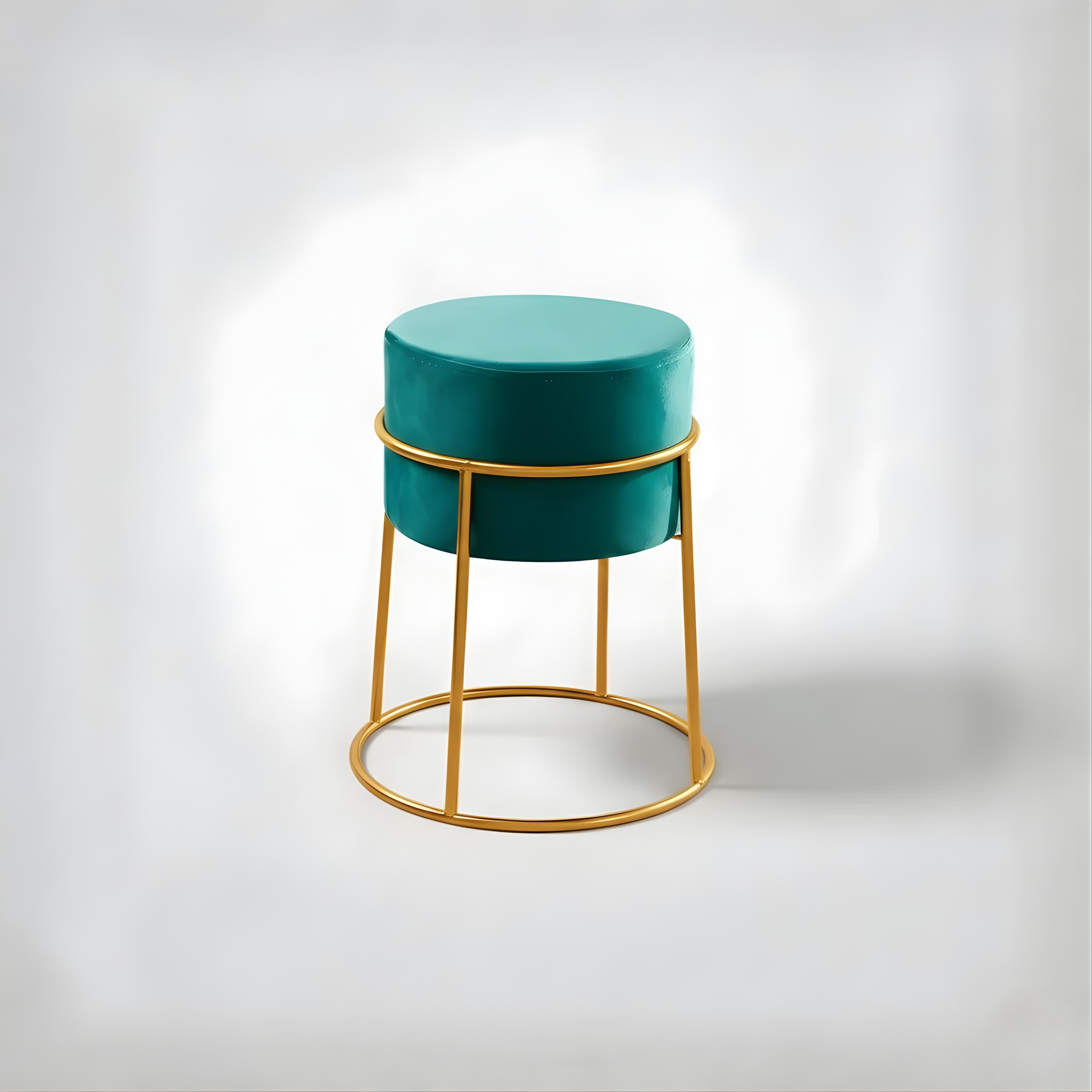 Stylish round ottoman with golden legs, portable comfort stool.