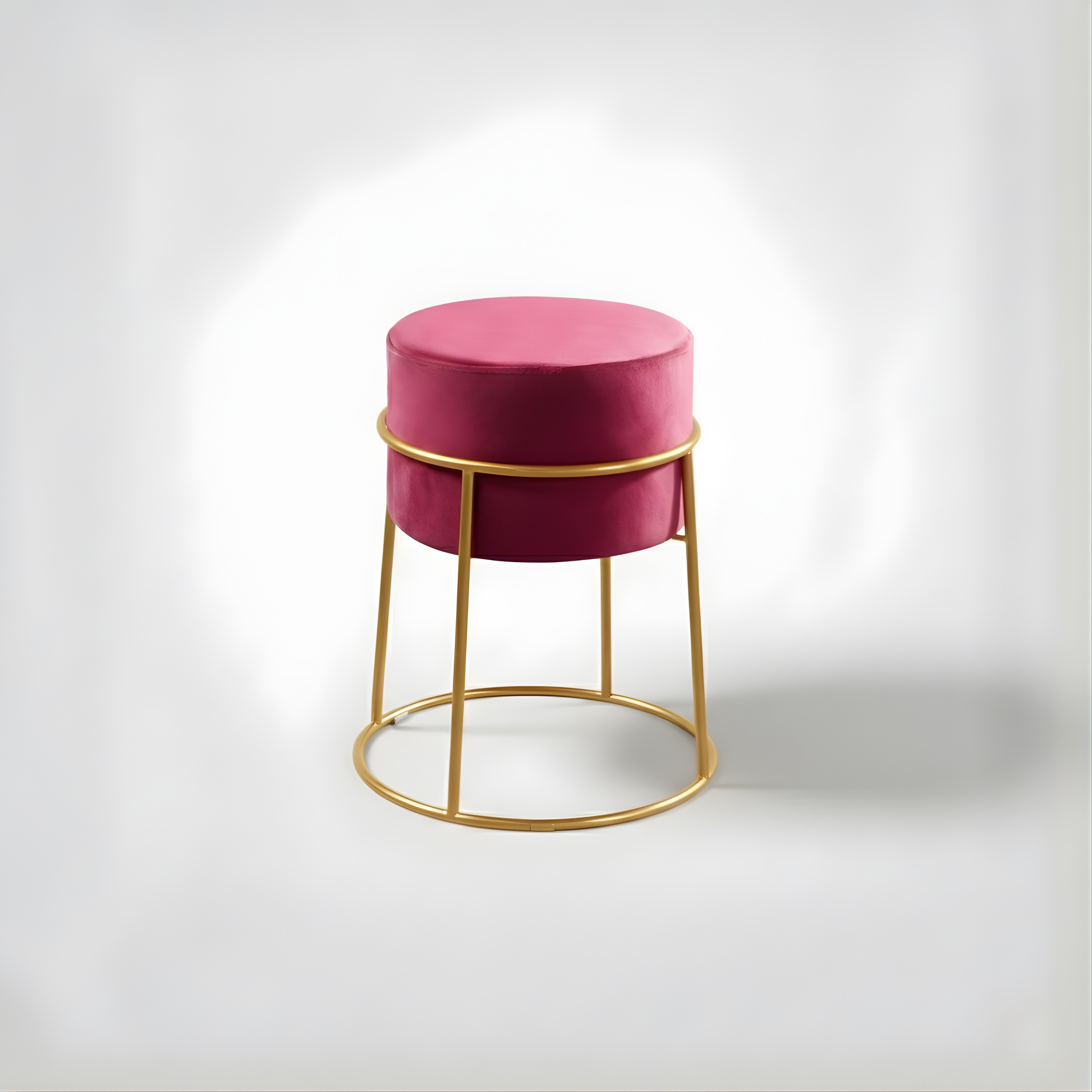 Stylish round ottoman with golden legs, portable comfort stool.
