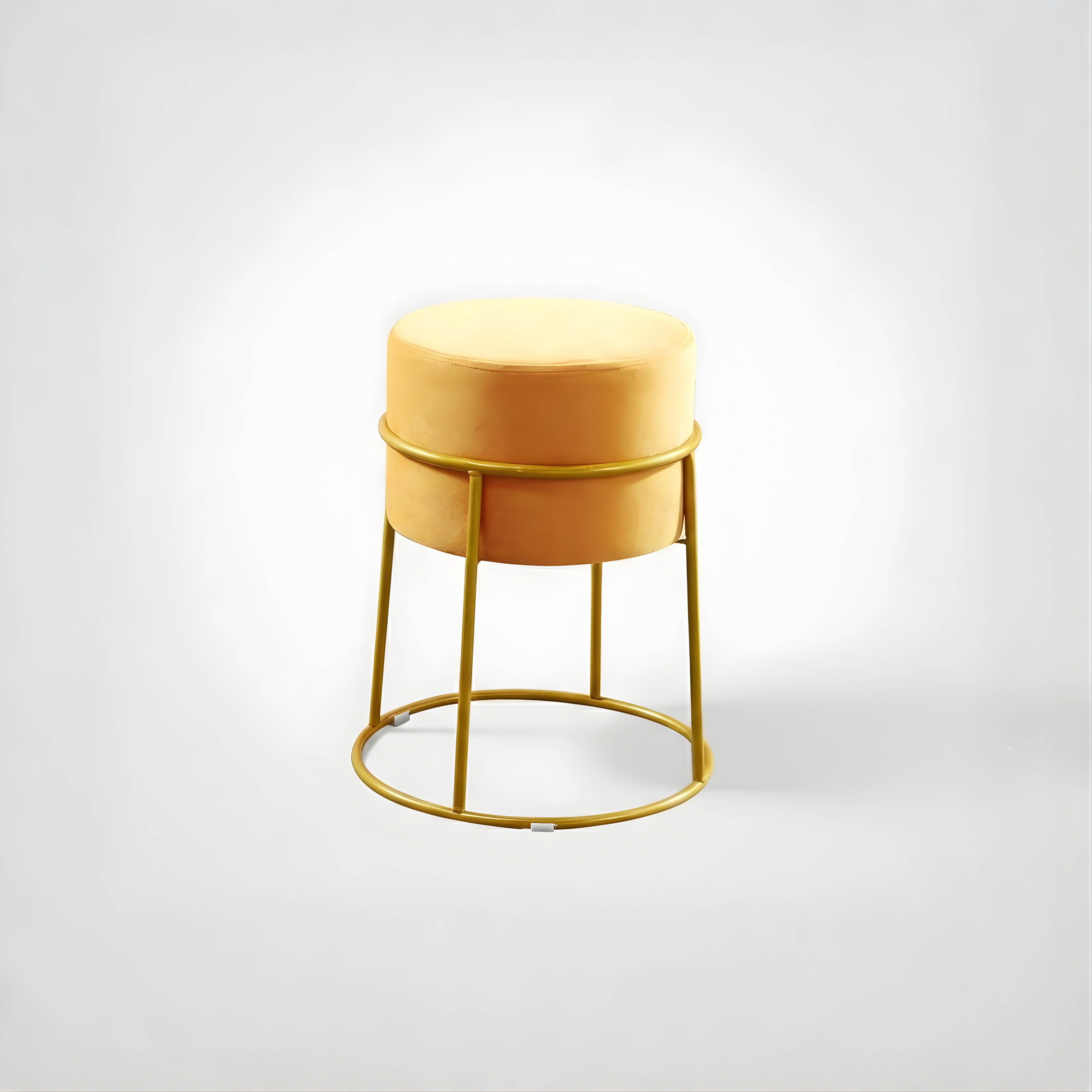Stylish round ottoman with golden legs, portable comfort stool.