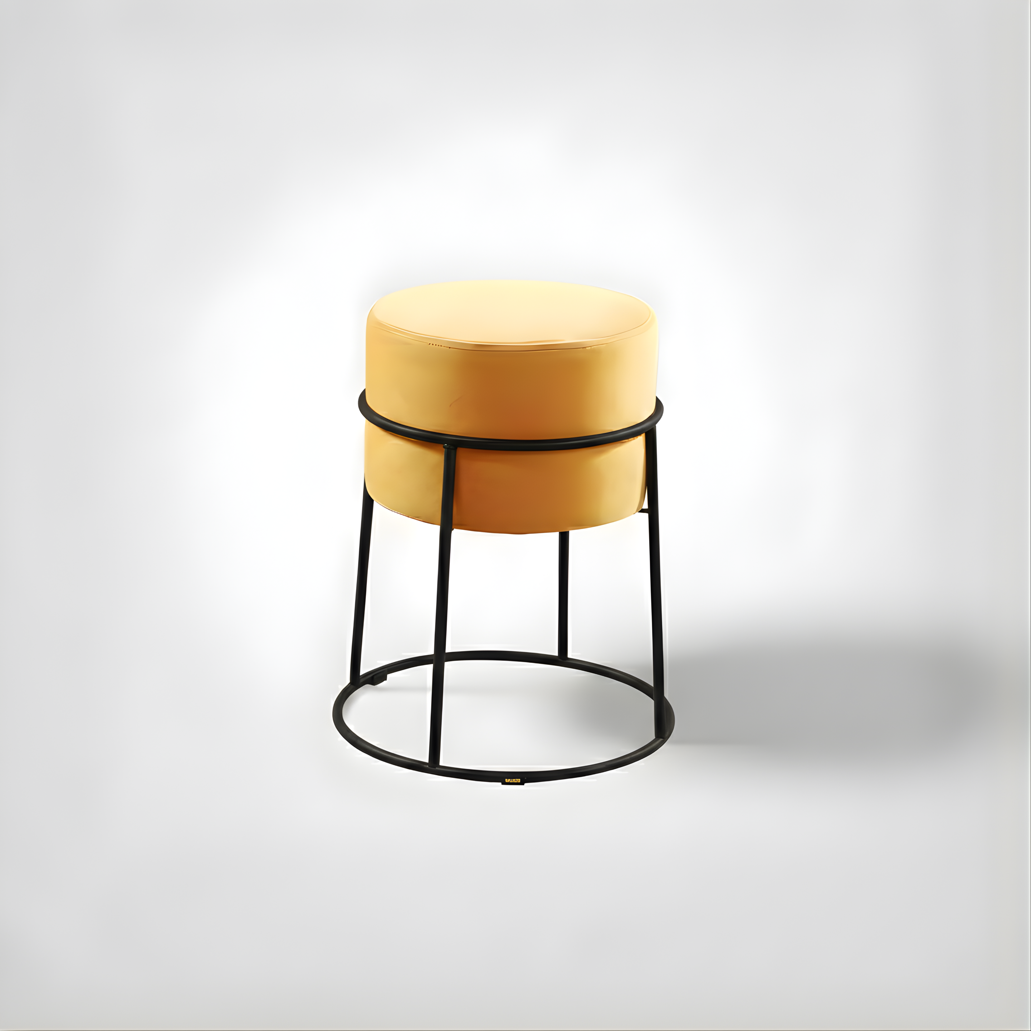 Stylish round ottoman with golden legs, portable comfort stool.