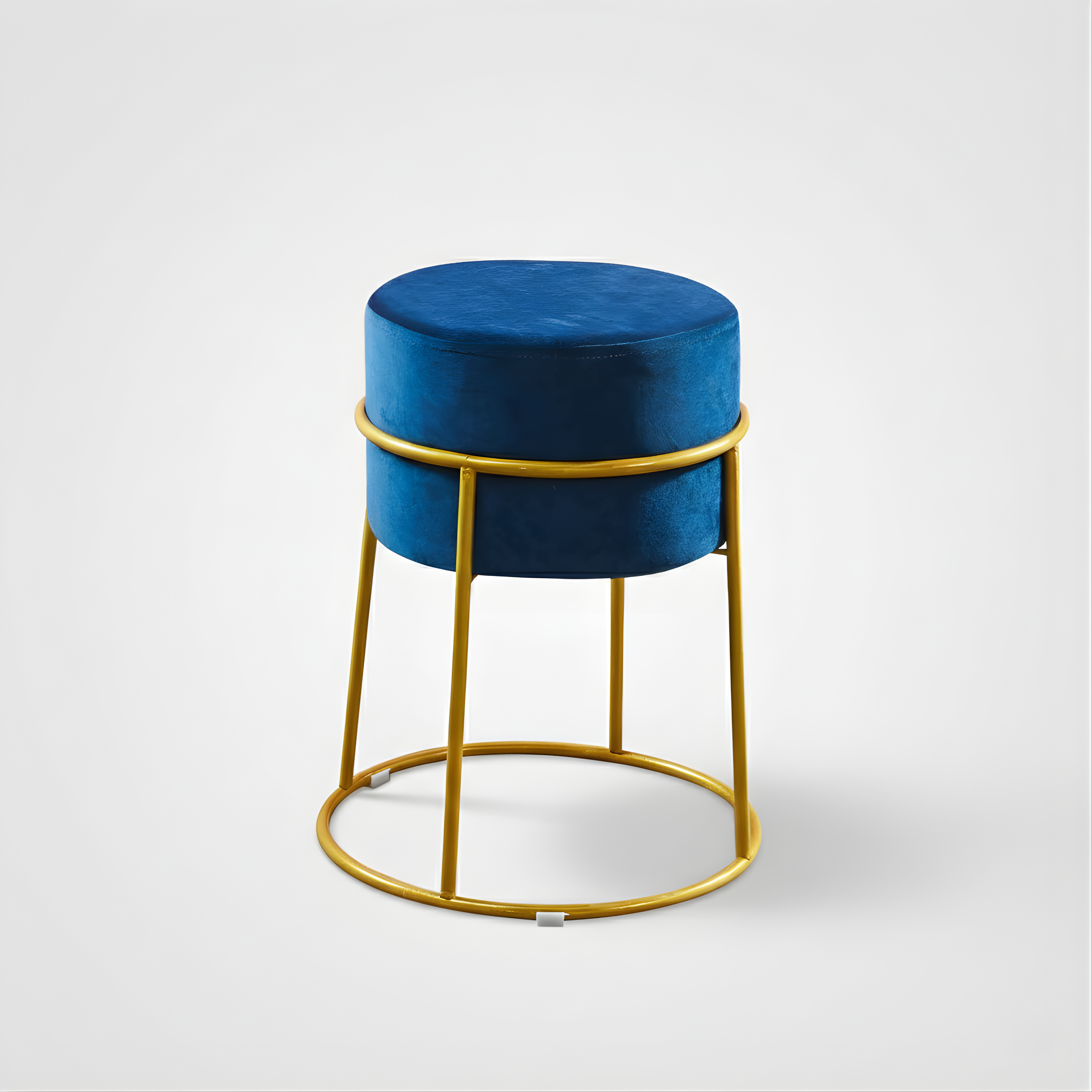 Stylish round ottoman with golden legs, portable comfort stool.